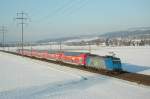 Die BR 185 527-9 und 525-3 der BLS fahren mit einer Ersatzkomposition der DB fr die S1 15160 Thun - Fribourg (Ltschberger!) aus Kiesen, aufgenommen am 23.12.08.