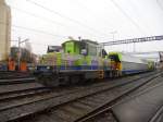 Der Tm 98 85 5235 093-2 steht mit Rollmaterial des BLS Baudienst im Areal des Bahnhof Spiez am 23.11.2010.