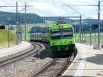 BLS - Regio nach Laupen bei der einfahrt in den Bahnhof Tgetschi am 28.05.2011