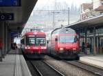 bls / SBB - Regio nach Interlaken sowie IC nach Brig im Bahnhof Spiez am   23.03.2013