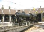 Delmont/Delsberg Juli 1997.Die Gotthard Lok C 5/6 2978   fhrt gerade auf die Drehscheibe.Im Schuppen erkennt man noch schwach den UeBB Dampftriebwagen CZm 1/2 (Archiv P.Walter)