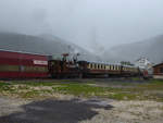 VVT - Dampfzug mit der E 3/3 8511 im strömenden Regen vor dem Depot der VVT in St. Sulpice am 05.10.2019