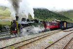 Lok HG 4/4 708 startet zu ihrer ersten kommerziellen Fahrt in Realp nach Furka - Oberwald. Das Foto wurde ausserhalb des Gleisbereichs aufgenommen. Realp, 17.7.2025