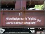 Transwaggon Langholzwagen in Ems Werk. Die zweite Sprache ist nicht romanisch, wie es in Domat/Ems gesprochen wird, sondern muss wohl finnisch sein. (20.06.2007)