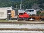 Tm 234 074-3 steht am 16.8.2007 vor einem Lokschuppen in Brig