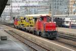 Kranexpress: Die Am 841 032-6 durchfhrt am 15.03.10 mit einem Xs-Flachwagen, einem Tm 234 (mit Kran ausgerstet) und zwei Kranwagen (XTms ??) den Bahnhof ZH Altstetten und das mit einem Endsignal an der Front.