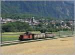 Eine Em 3/3 mit zwei Eaos (Schrott aus Untervaz) auf dem Weg nach Landquart bei Zizers. (09.07.2008)