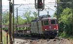 Re 10/10 mit leerem Autotransportzug unterwegs an der Bzberg-Sdrampe in Richtung Basel