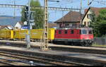SBB - Re 4/4  420 259-4 mit Postzug im Bahnhof Lenzburg am 30.07.2026