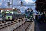 BLS und Verein Mikado 1244: RABe 525 027, Pendelverkehr Kerzers-Lyss-Kerzers, und Ae 6/6 11407, Zug 31115 Kerzers-Interlaken Ost (nicht �ffentlicher Reisezug), Kerzers, 14.