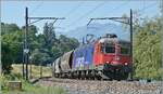 Die SBB Re 6/6 11621 (Re 620 021-6) ist kurz nach Villeneuve mit dem  Spaghetti -Zug auf der Fahrt in Richtung Vallorbe.  

19. Juni 2026
