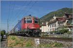 Die SBB Re 6/6 11665 (Re 620 065-3)  Ziegelbr�cke  ist mit einem G�terzug bei Ligerz - un�bersehbar bei Kilometer 94.4 - auf dem Weg in Richtung Biel/Bienne. 

16. Juli 2026