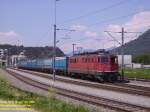 Ae 6/6 11470  Brugg  steht mit dem 72426 nach Menznau in der bergabeanlage Domat Ems abfahrbereit.
13.05.08