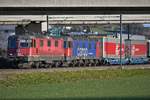 Re 10/10 (Re 420 336-0 zusammen mit Re 620 079-4  Cadenazzo  auf dem Weg Richtung Basel bei Sissach am 05.01.2020.