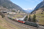 Am 20.03.2015, dem Tag der partiellen Sonnenfinsternis in Europa, verkehrten am Gotthard die Re 6/6 11663  Eglisau  und die Re 4/4 II 11332 mit einem Containerzug in südlicher Richtung.