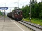 bls - Re 4/4 174 mit Gterzug bei der durchfahrt im Bahnhof Uttigen am 25.06.2013