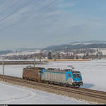 Bereits einige Kilometer weiter als auf dem Bild von Walter Ruetsch (ID 992250) befindet sich die 187 003 mit der Re 4/4 185 im Schlepp am 28. Januar 2017 bei Kiesen.