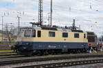 Re 421 387-2 in Rheingold Look steht am 20.03.2023 auf einem Abstellgleis beim badischen Bahnhof.