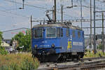Re 430 115-6 der WRS durchfährt am 16.06.2023 den Bahnhof Pratteln.