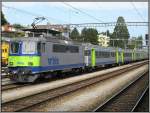 Re 420 007 war am Vormittag des 27.07.2008 mit diesem Regionalzug im Bahnhof von Spiez abgestellt.