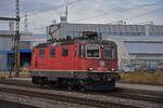 Re 420 319-6 durchfährt solo den Bahnhof Rupperswil. Die Aufnahme stammt vom 07.01.2022.