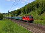 Die Re 4/4 11155 mit einem Regio am 10.05.2013 unterwegs bei Tecknau.