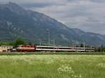Die Re 4/4 11109 mit einem Reintalexpress am 09.05.2013 unterwegs bei Bad Ragaz.