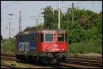 SBB Cargo Lok 421393 fährt hier am 11.5.2006 durch den Bahnhof Köln West.