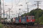 421 389-8 und 421 395-5 mit einem Güterzug bei der Durchfahrt in Köln Gremberg, 5.8.10