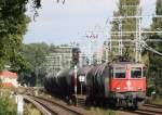 25.9.2012 421 396 von SBB Cargo passiert S-Bahn Einfahrsignal 971 in Zepernick mit beladenem Kesselzug.