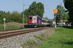 Auf der Fahrt von München nach Zürich zieht Re 421 383-1 die in Lindau übernommenen Wagen des EC 196 am 11.09.2016 am Einfahrvorsignal von Lindau-Reutin vorbei.