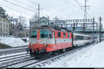 Swiss Express Re 4/4 II 11108 am 18. Dezember 2017 mit einem IR St. Gallen - Basel in Winterthur.