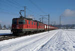 Erste Winteraufnahmen des Jahres 2019 aus meiner Region Solothurn mit Sonne und Schnee.
TWS - Tankcontainerzug  SIRUPZUG 48683 Basel Bad Bf - Aarberg   bei Deitingen mit Doppeltraktion Re 420 am 29. Januar 2019. An der Spitze dieses Zuges eingereiht ist die Re 420 263-6.
Foto: Walter Ruetsch  