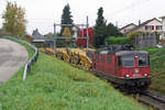 Re 420 332-9 mit einem Bauzug am Hacken der Vanoli Gleisbau AG bei Biberist am frühen und trüben Morgen des 9.