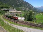 125 Jahre Gotthardbahn - Mit IR 2169 Basel - Locarno will am 07.07.2007 SBB Re 11138 die Gotthard-Nordrampe erklimmen. Wir befinden uns hier an der  untersten Etage  in der Nhe des 1.084m langen Wattinger Kreiskehrtunnels. Vor uns liegt Wassen mit der wohl bekanntesten Kirche der Gotthardbahn. Die Fotostelle ist vom  Wanderweg Gottardo  ausgeschildert. Einfach dem Symbol mit dem Fotoapperat ab dem Ortseingang Wassen aus Richtung Gschenen folgen. In der Gegenrichtung ist die Stelle natrlich auch ausgeschildert! brigens mussten wir selten lnger als 10 min auf einen Zug warten! Trotzdem hat die Wanderung ab Gschenen bis Gurtnellen gute 8h gedauert.
 Absolut empfehlenswert zur Wanderung ist das soeben neu erschienene Buch  Wanderweg Gottardo - Zu Fuss entlang der Gotthardbahn  aus dem AT-Verlag. Die ISBN lautet 978-3-03800-353-3. Das Buch ist in gut sortiertem Buchhandel erhltlich.