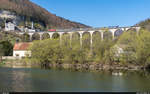 SBB Re 4/4 II 11114 mit Militärextrazug Bure-Casernes - Basel SBB am 23. April 2021 auf dem Viaduc de la Combe Maran in St-Ursanne.