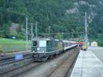Die noch grne Re 4/4 II 11158 fuhr am 14.07.2007 mit dem IR 2192 (Pan Gottardo und Speisewagen am Zugschluss) durch den Bahnhof Amsteg-Silenen.