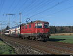SBB - 420 143 mit 2 Personenwagen unterwegs bei Lyssach am 05.04.2023