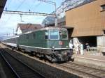 Re 4/4 11158 mit einem Reisezug in Erstfeld. (08.09.2007)