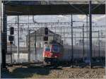 Re 4/4 II 11221 mit EC Vorarlberg nach Wien Westbf biegt auf die Verbindunkslinie nach Trbbach und Buchs SG ein. (29.01.2008)