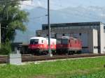 EM-Lok 1116 087 Polen sonnt sich neben einer Re 420 im Deopt Buchs/SG, Sommer 2008