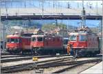 Re 4/4 II 11256, 11215 und RBe 540 031-2 in Chur. (19.07.2009)