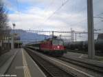 Re 4/4'' 11200 mit RE 3815 nach Chur in Buchs SG