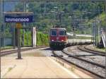 IR2178 von Locarno nach Luzern mit Re 4/4 II 11302 fhrt durch Immensee. (30.07.2010)