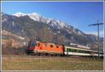 Vor dem Vilan verlsst RE3832 mit Re 4/4 II 11214 Maienfeld. (04.01.2011)