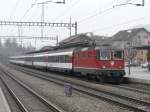 SBB - Re 4/4  11112 vor IR im Bahnhof Sissach am 07.04.2013