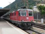 SBB - Re 4/4 11194 mit Ersatz EC nach Milano bei der ausfahrt aus dem Bahnhof Bellinzona am 18.09.2013