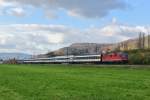 Re 4/4 II 11115 mit IR 2177 bei Sissach, 25.11.2013.