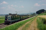 SBB: Anfangs der 90er-Jahre wurde bei Schönbühl verewigt:  Schnellzug von Bern-Biel mit einer Re 4/4 II 11325.