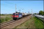 421 378-1 vor einem lpendelzug nach Rostock Seehafen.